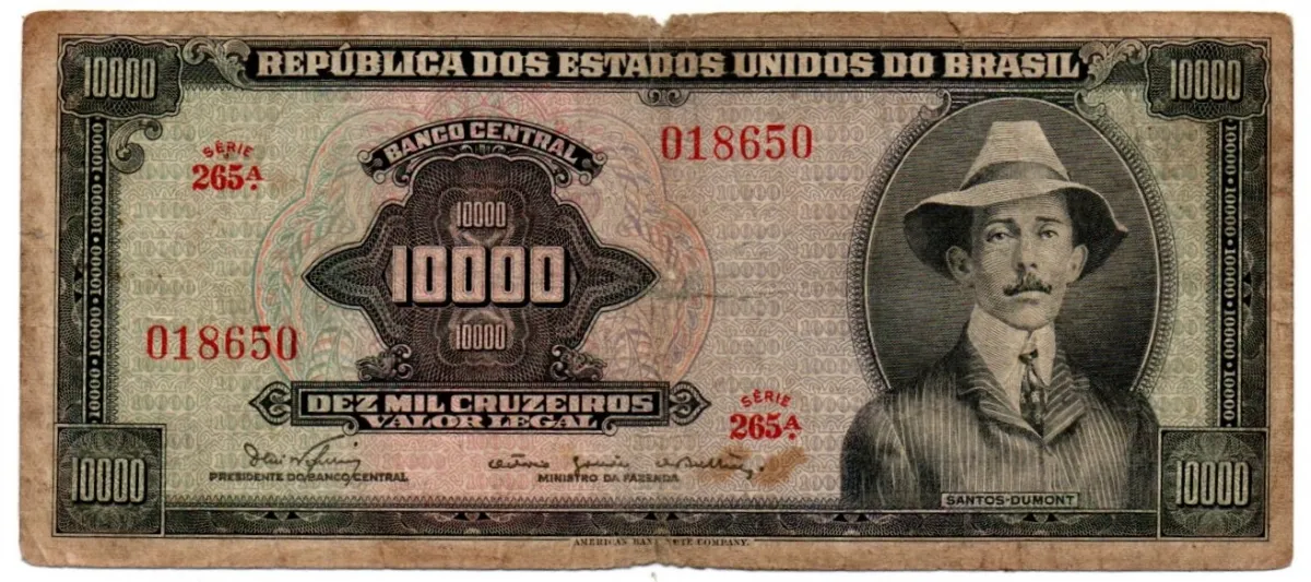 C060 - 10000 Cruzeiros - 1° Estampa - Série Aleatória - Santos Dumont - Data: 1966 - Estado de Conservação: Bem Conservada (BC)