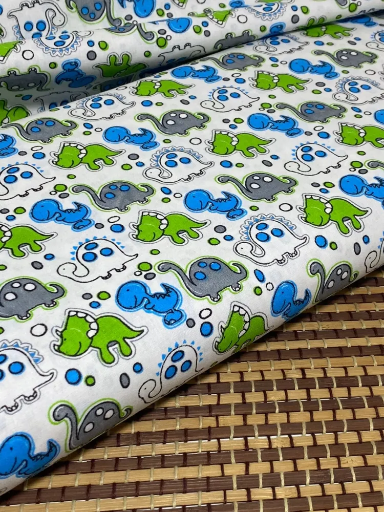 TECIDO TRICOLINE 1,50CM DE LARGURA DINO REF 22 Imagem