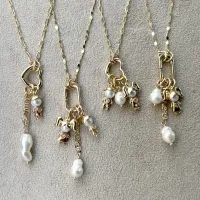 Pingente Filhos Dourado com Cabeça de Pérola - Foto 2