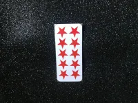 Cartela com 10  adesivos em formato de estrelinha (estrela)