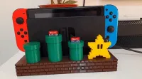 SUPORTE NINTENDO SWITCH DOCK / DOCK OLED MARIO BROS NINTENDO SWITCH DOCK MARIO BROS PEZINHO DE BORRACHA - Foto 8
