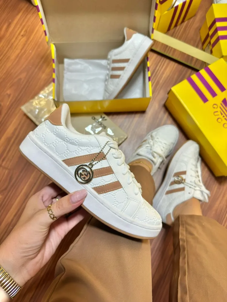    Tênis adidas x gucci     