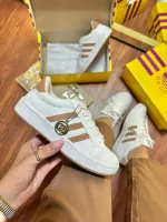    Tênis adidas x gucci     
