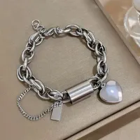 PULSEIRA DE CORRENTE GROSSA EM AÇO INOXIDÁVEL, COM PINGENTE CORAÇÃO, BANHADO A PRATA 925