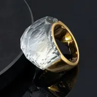 ANEL EM AÇO INOXIDÁVEL COM PEDRA BRANCA, BANHADO A OURO 18K