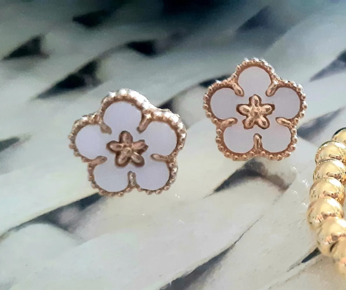 Brinco Flor Van Cleef & Arpels 