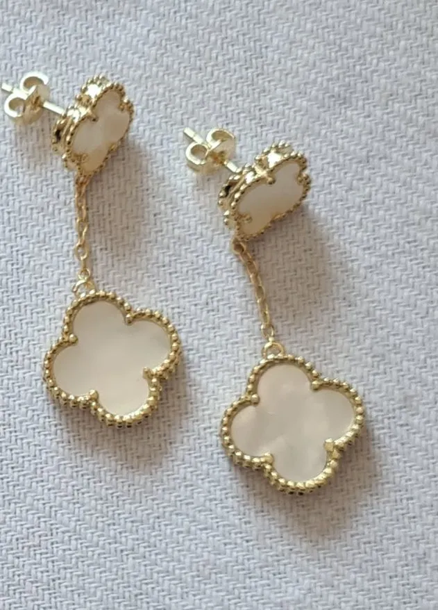 Brincos  VCA  compridos.  Imagem