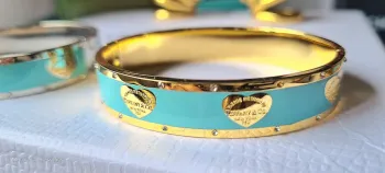 Bracelete Tiffany&Co rosa /azul rígido. 